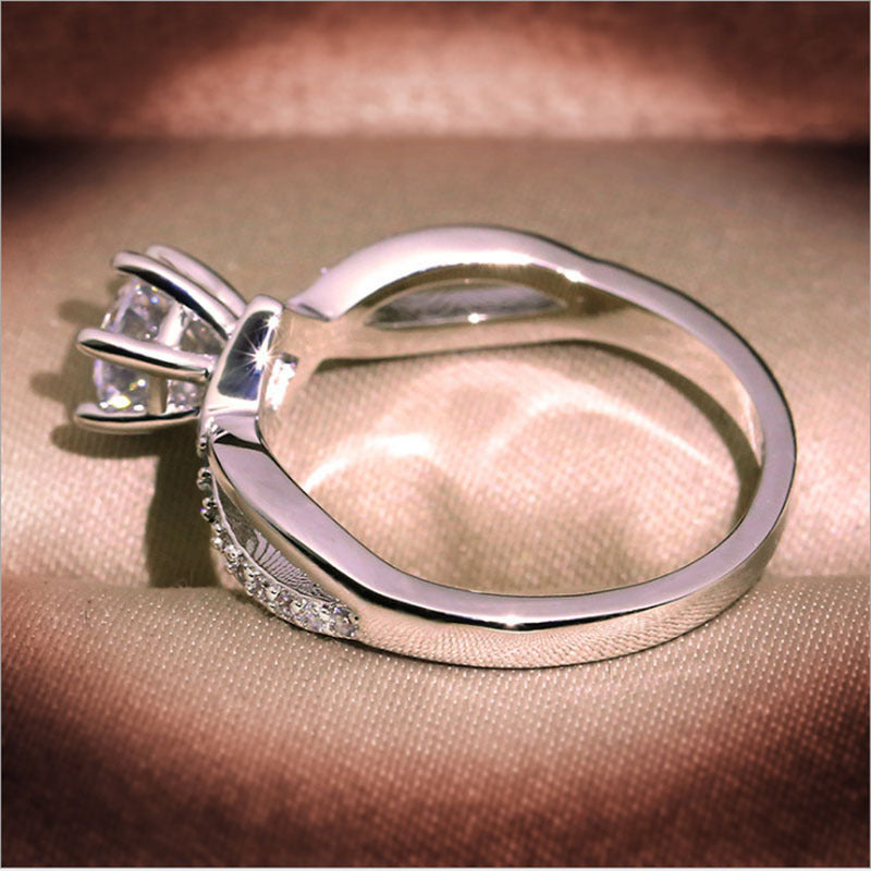 Twisted Shank Six-Prong Solitaire Diamond Ring