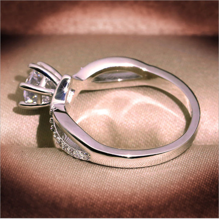 Twisted Shank Six-Prong Solitaire Diamond Ring