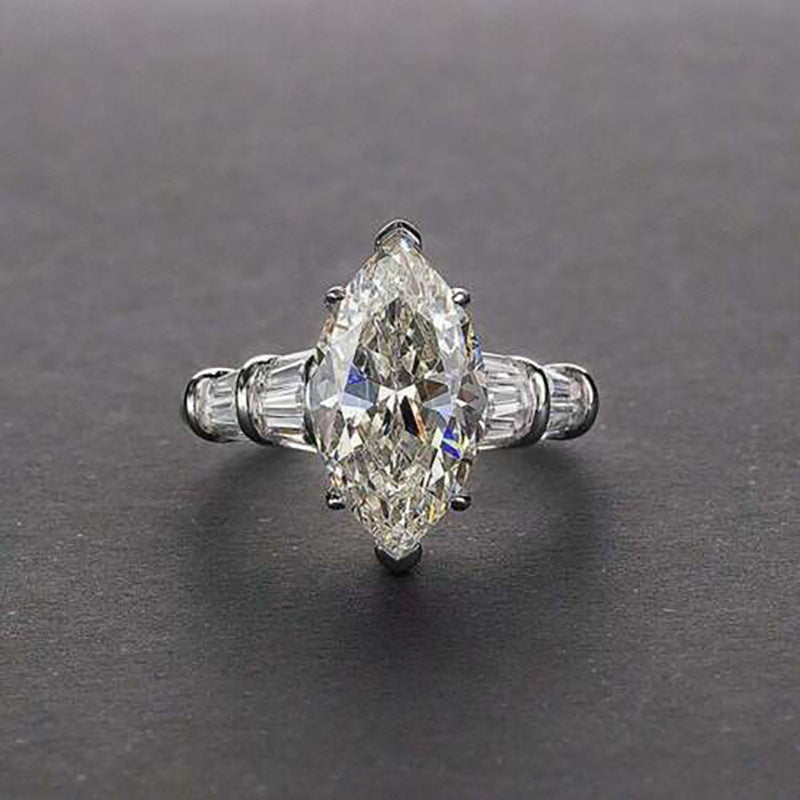Marquise Center Stone Ring With Baguette Accents