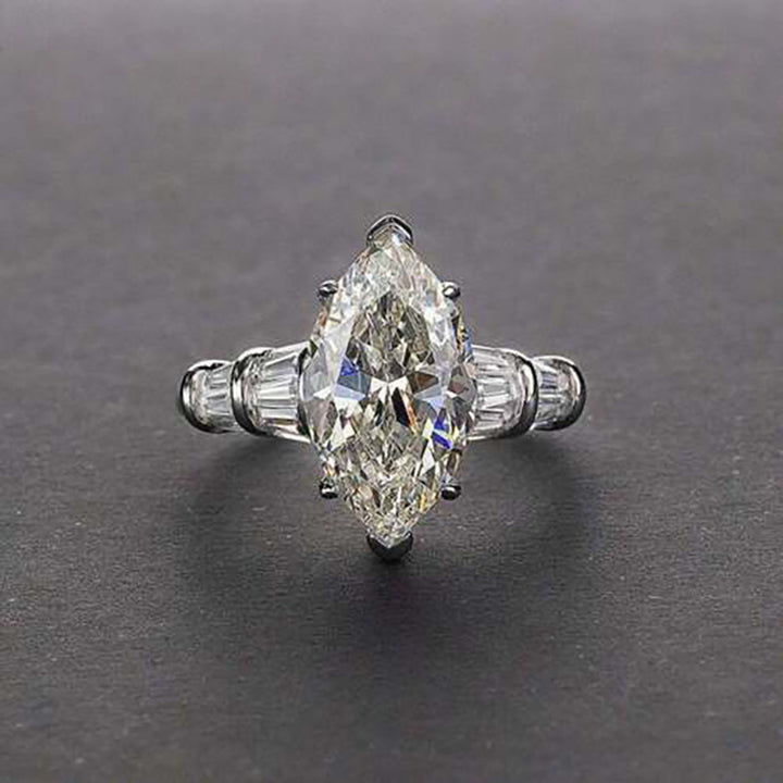 Marquise Center Stone Ring With Baguette Accents