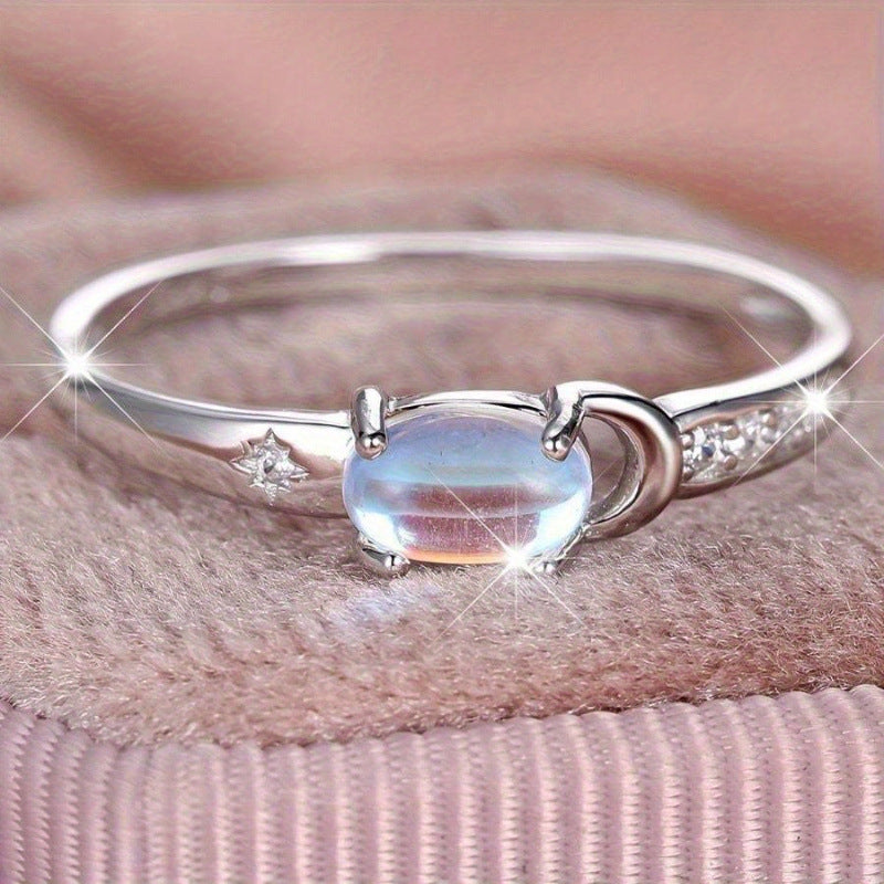 Moon‑Star Oval Iridescent Moonstone Thin‑Band Ring
