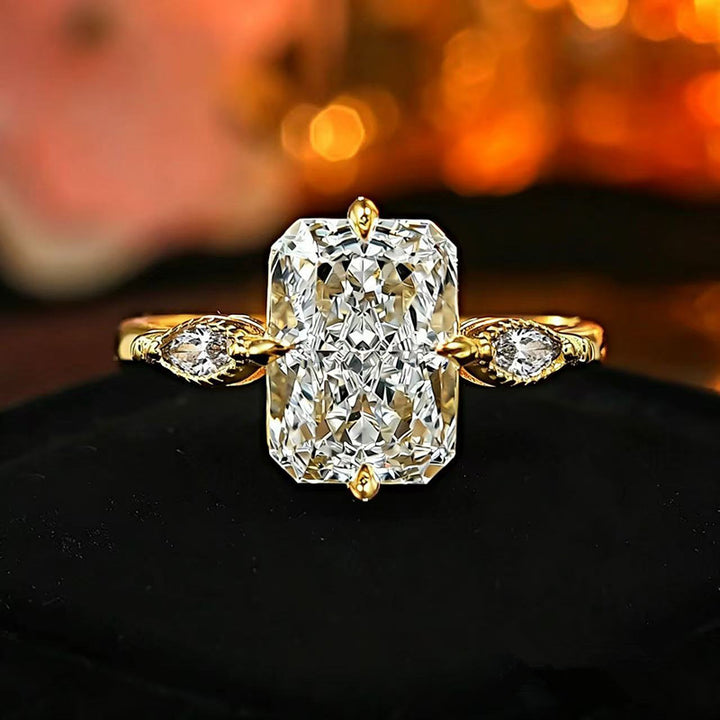 Radiant‑Cut Rectangular Center Diamond Engagement Ring With Marquise Side Diamond, Gold & Silver Options