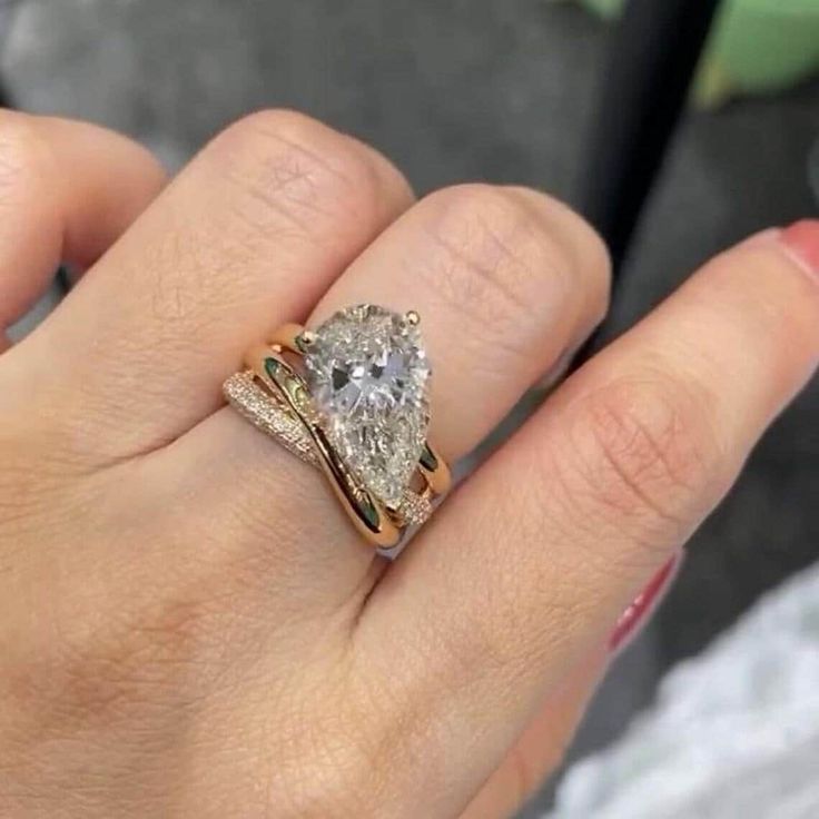 Pear‑Shaped Teardrop Stone Twisted Shank Women’s Engagement Ring