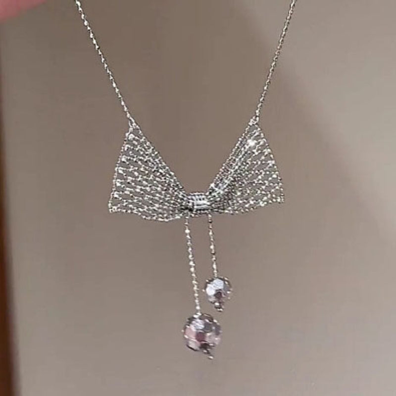 Hollow‑Mesh Bow Pendant Necklace