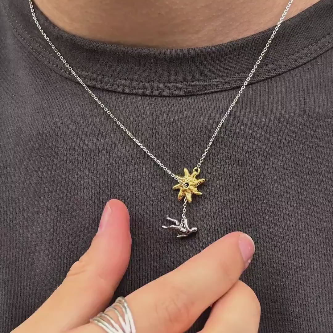 Abstract Star & Falling Figure Pendant Necklace – Minimalist Artistic Chain