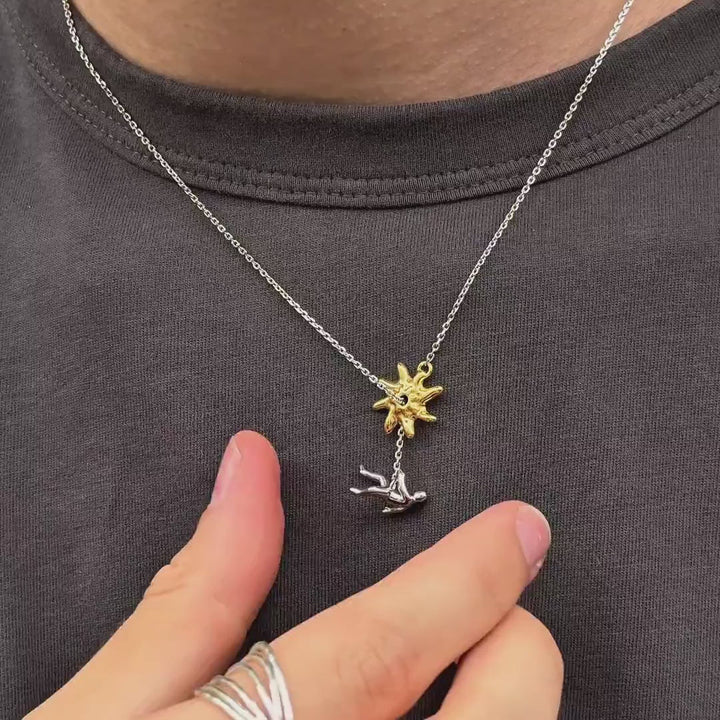 Abstract Star & Falling Figure Pendant Necklace – Minimalist Artistic Chain