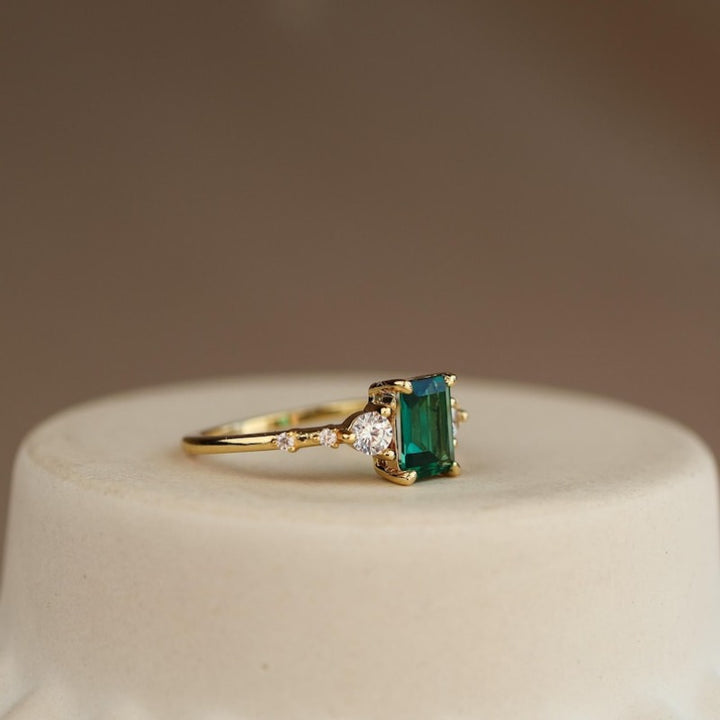 Emerald‑Cut Green Center Stone Three‑Stone Ring, Gold & Silver Two‑Tone Options