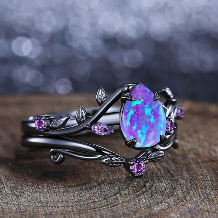 Black‑Plated Teardrop Opal Vine‑Shaped Ring With Purple Diamond