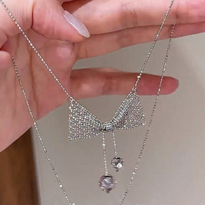 Hollow‑Mesh Bow Pendant Necklace