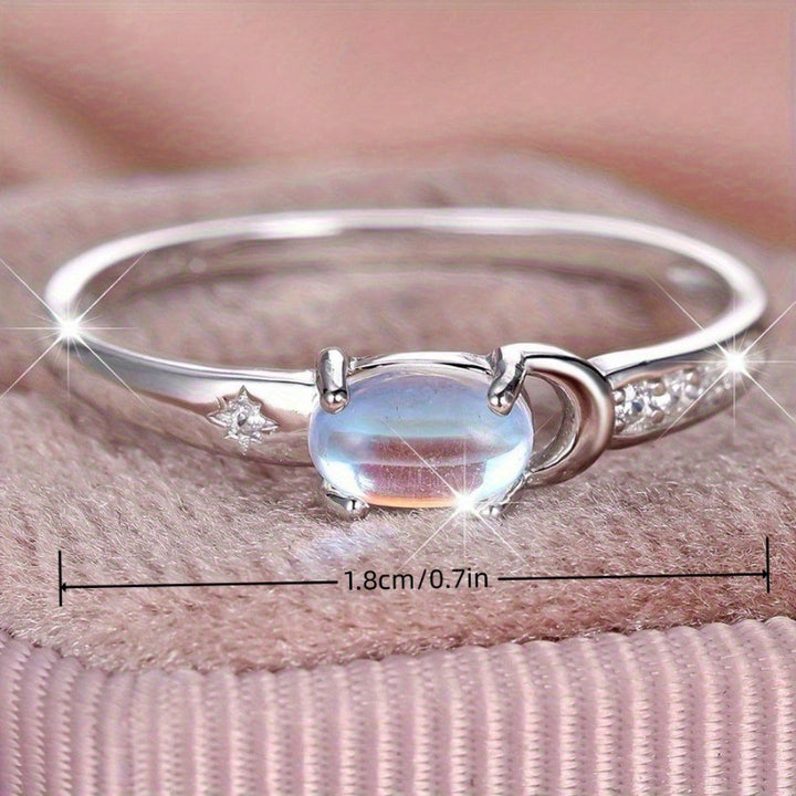 Moon‑Star Oval Iridescent Moonstone Thin‑Band Ring