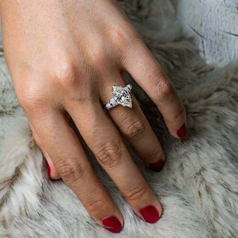 Marquise Center Stone Ring With Baguette Accents