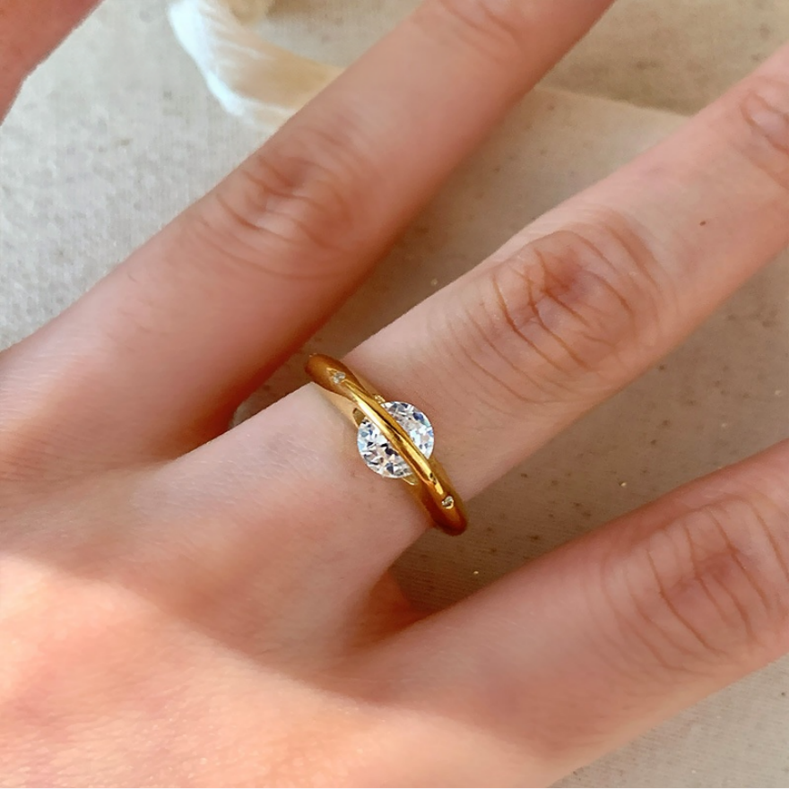 Encircling Wrapped Solitaire Ring