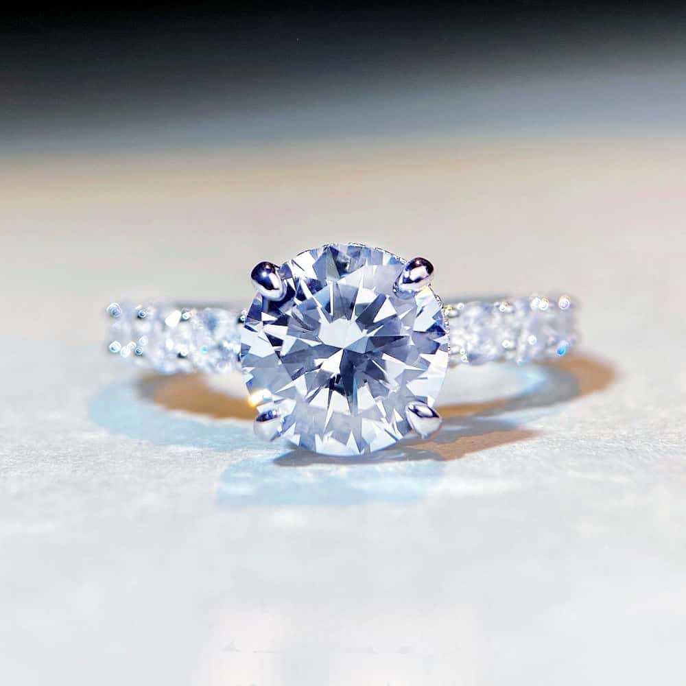 Round Stone Twisted Pave Ring