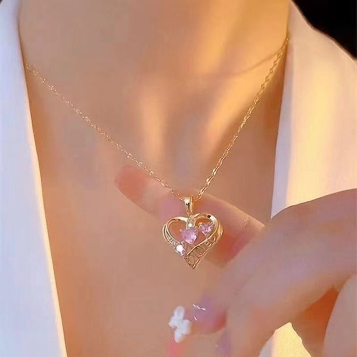 Hollow‑Out Heart‑Shaped Pendant Necklace With Three‑Heart Diamond, Two‑Color Options