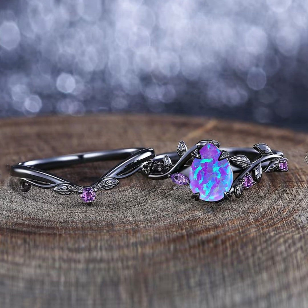 Black‑Plated Teardrop Opal Vine‑Shaped Ring With Purple Diamond
