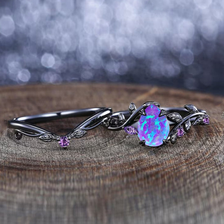Black‑Plated Teardrop Opal Vine‑Shaped Ring With Purple Diamond