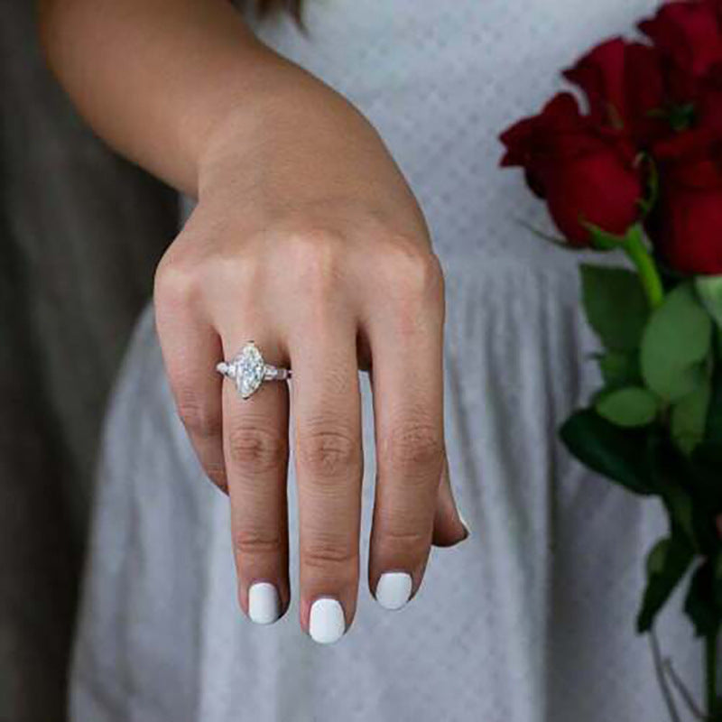 Marquise Center Stone Ring With Baguette Accents