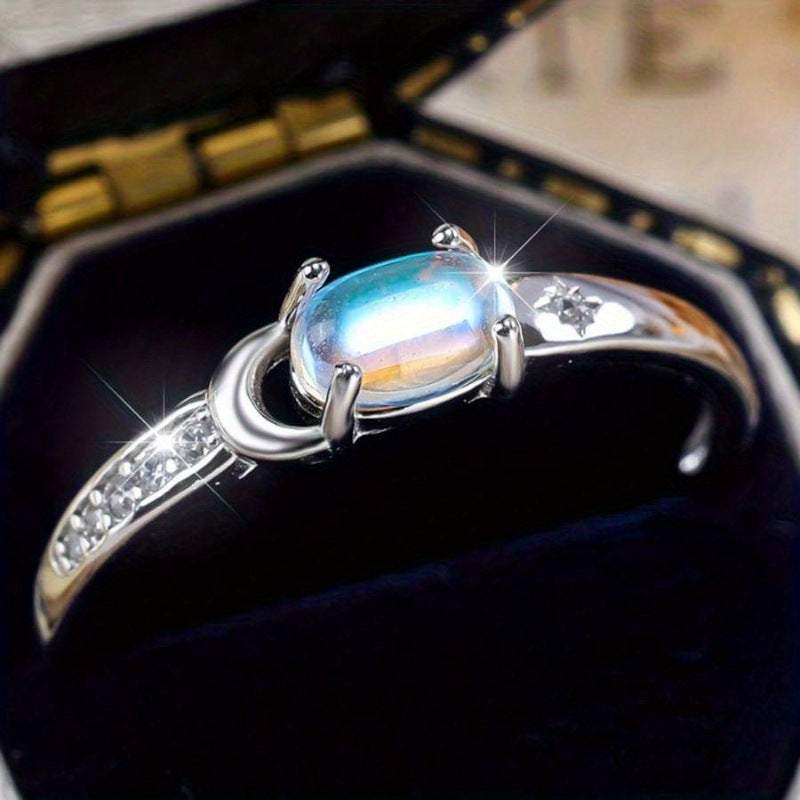Moon‑Star Oval Iridescent Moonstone Thin‑Band Ring