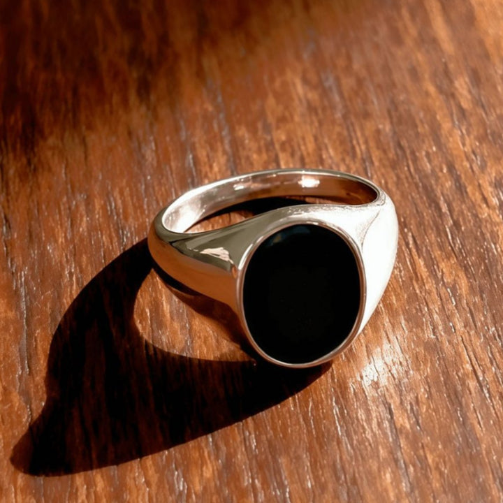 CopyMinimalist Oval Black Agate Titanium Steel Ring (Light Luxury Business Style)
