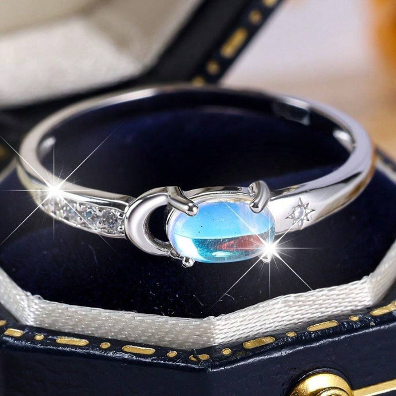 Moon‑Star Oval Iridescent Moonstone Thin‑Band Ring