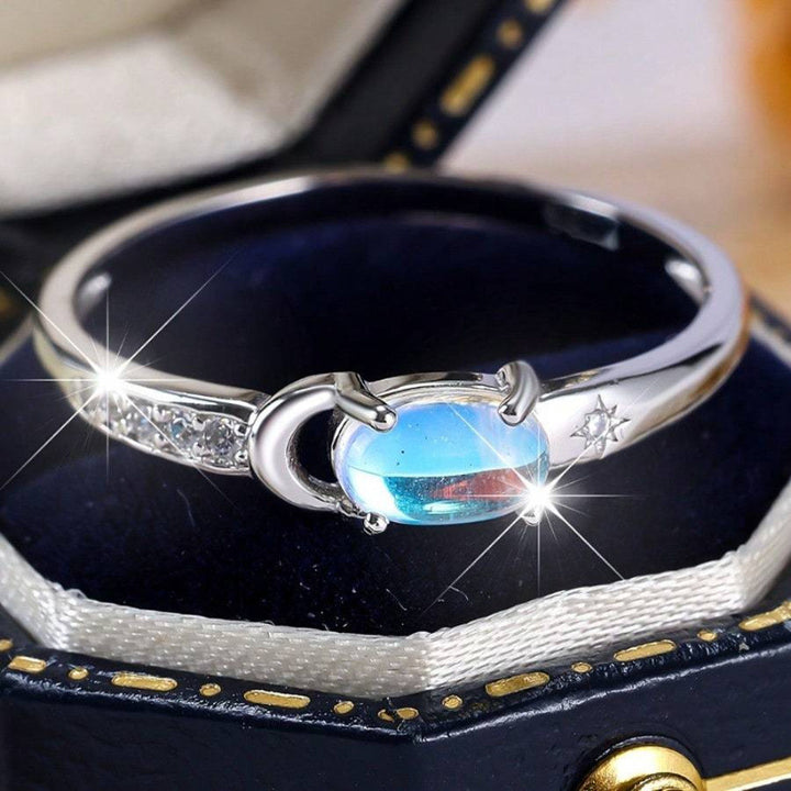 Moon‑Star Oval Iridescent Moonstone Thin‑Band Ring