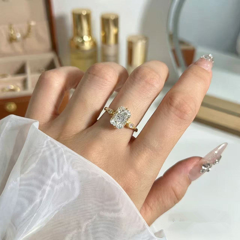 Radiant‑Cut Rectangular Center Diamond Engagement Ring With Marquise Side Diamond, Gold & Silver Options