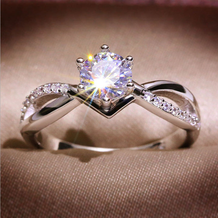 Twisted Shank Six-Prong Solitaire Diamond Ring