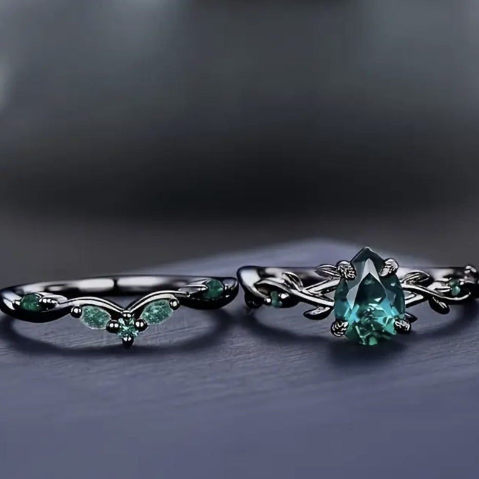 Dark‑Gunmetal Twisted‑Branch Teardrop Green Diamond Women’s Ring