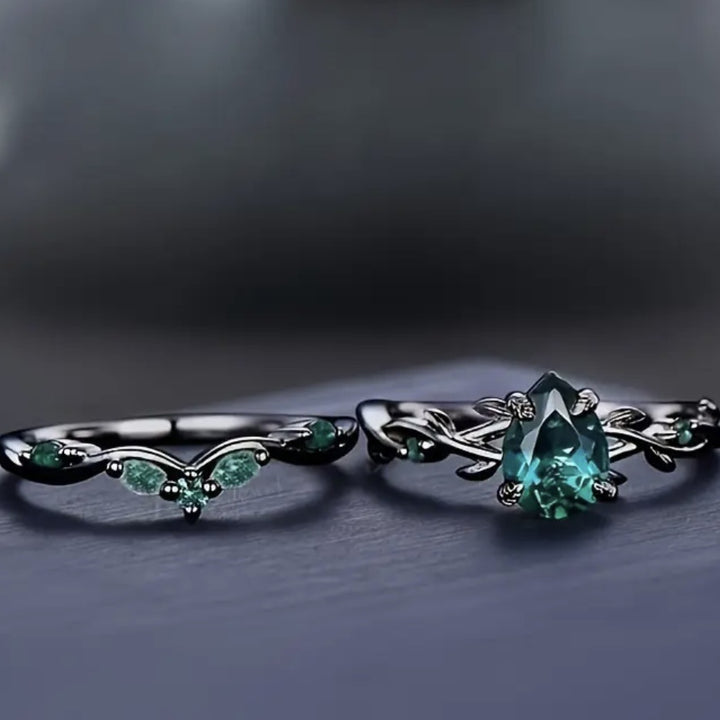 Dark‑Gunmetal Twisted‑Branch Teardrop Green Diamond Women’s Ring