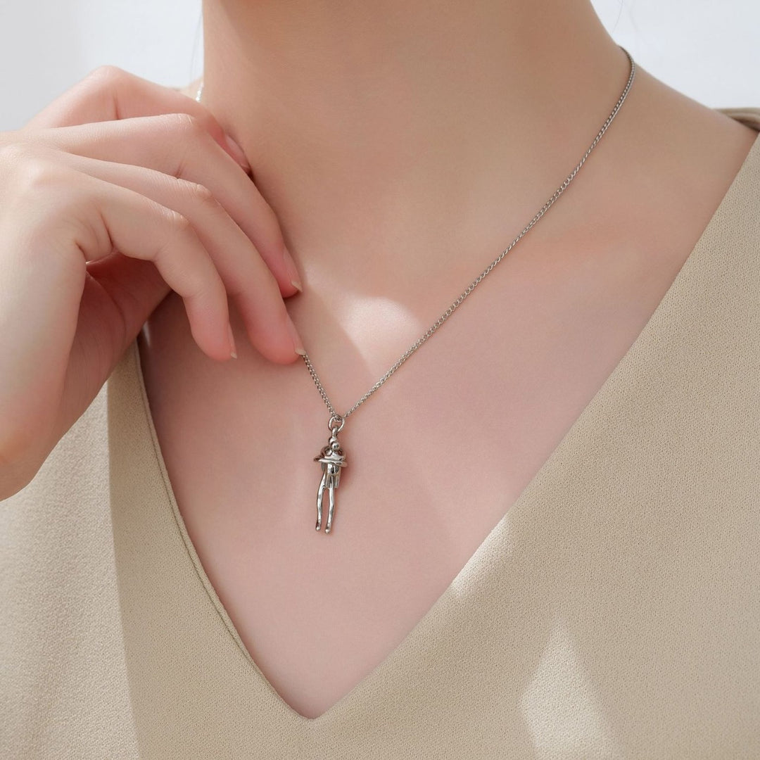 Elegant Mother and Child Embrace Pendant Necklace