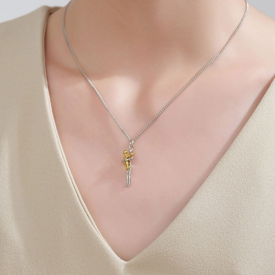 Elegant Mother and Child Embrace Pendant Necklace