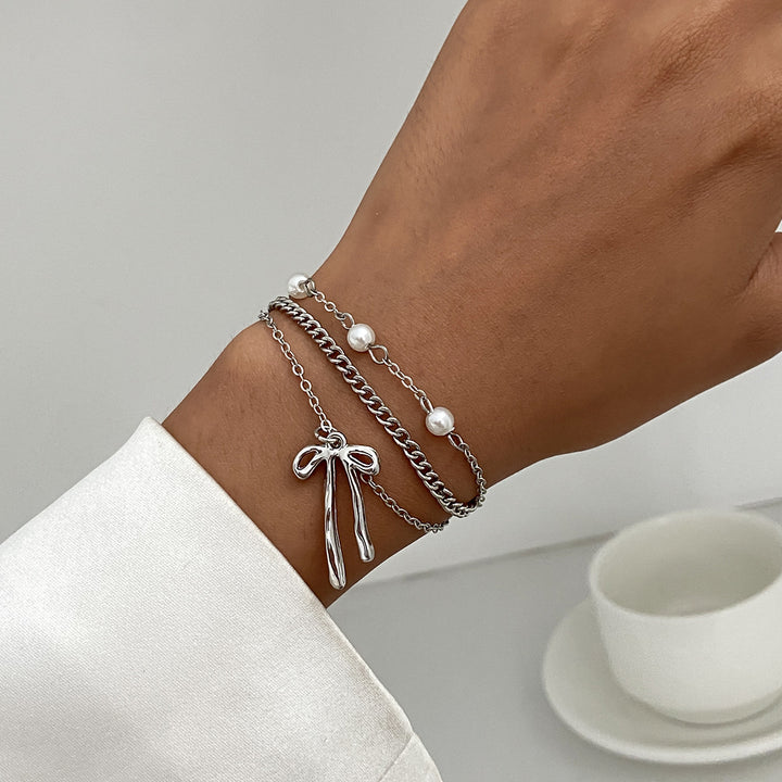 Layered Style Bow Pendant Bracelet Set