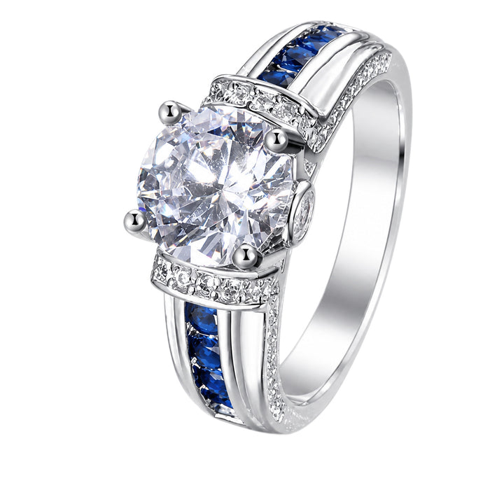 Men’s Four‑Prong Main‑Stone Ring With Blue Sapphire Accents