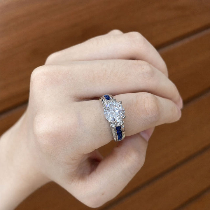 Men’s Four‑Prong Main‑Stone Ring With Blue Sapphire Accents