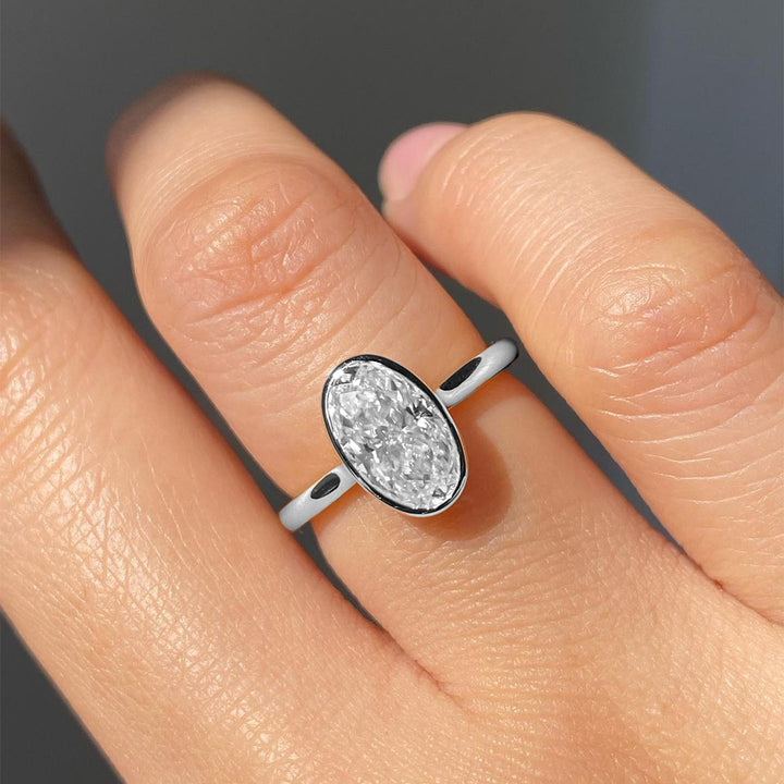 Oval Bezel Set Diamond Ring