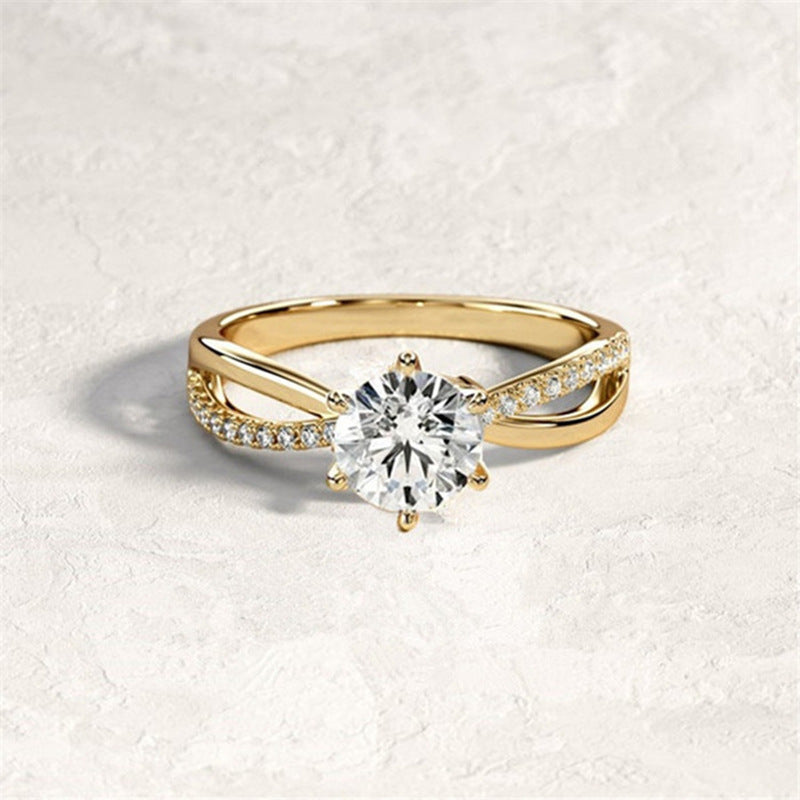 Twisted Shank Six-Prong Solitaire Diamond Ring
