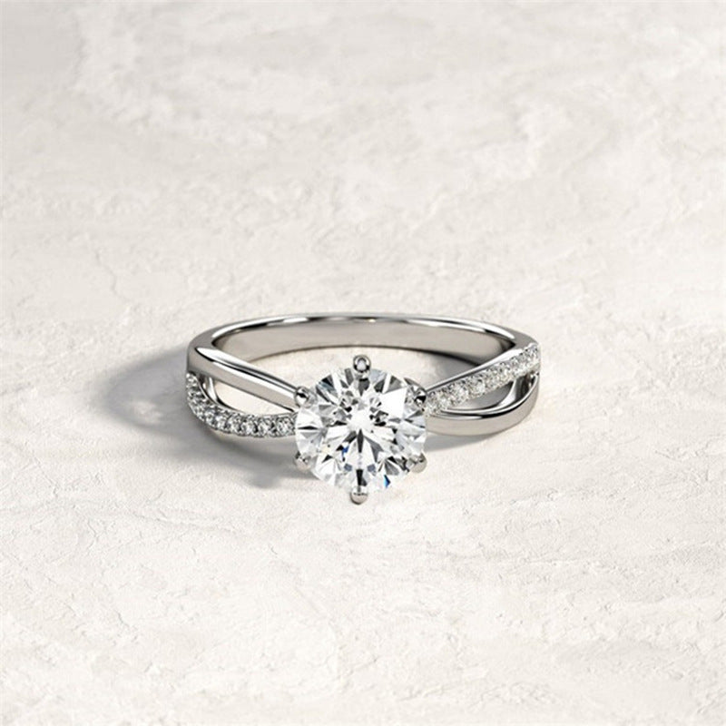 Twisted Shank Six-Prong Solitaire Diamond Ring