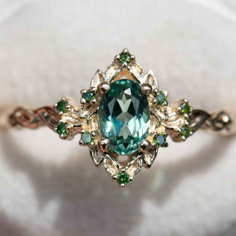 Vintage Forest-Style Oval Green Gem Ring (Two-Tone Gold Engagement Band)