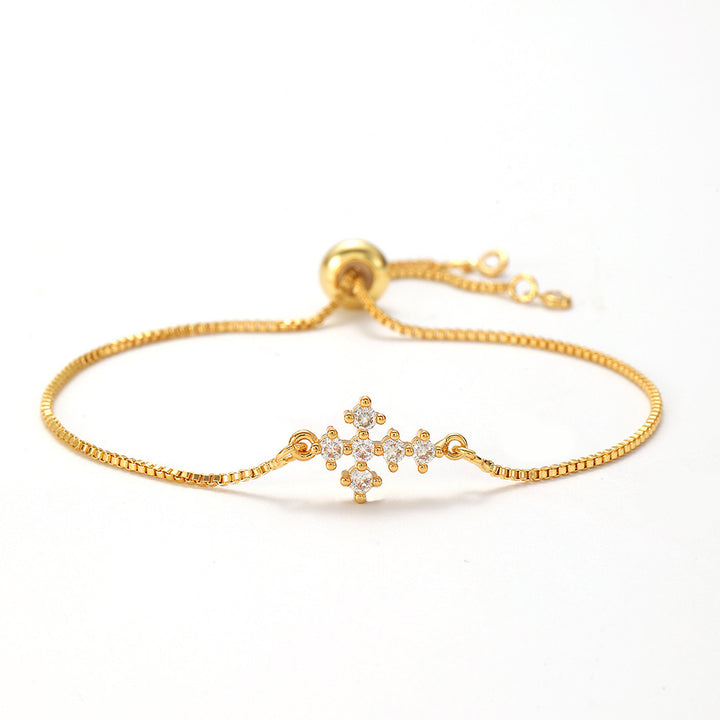Openwork cross zircon micro-pave bracelet, waterproof and hypoallergenic jewelry for women.