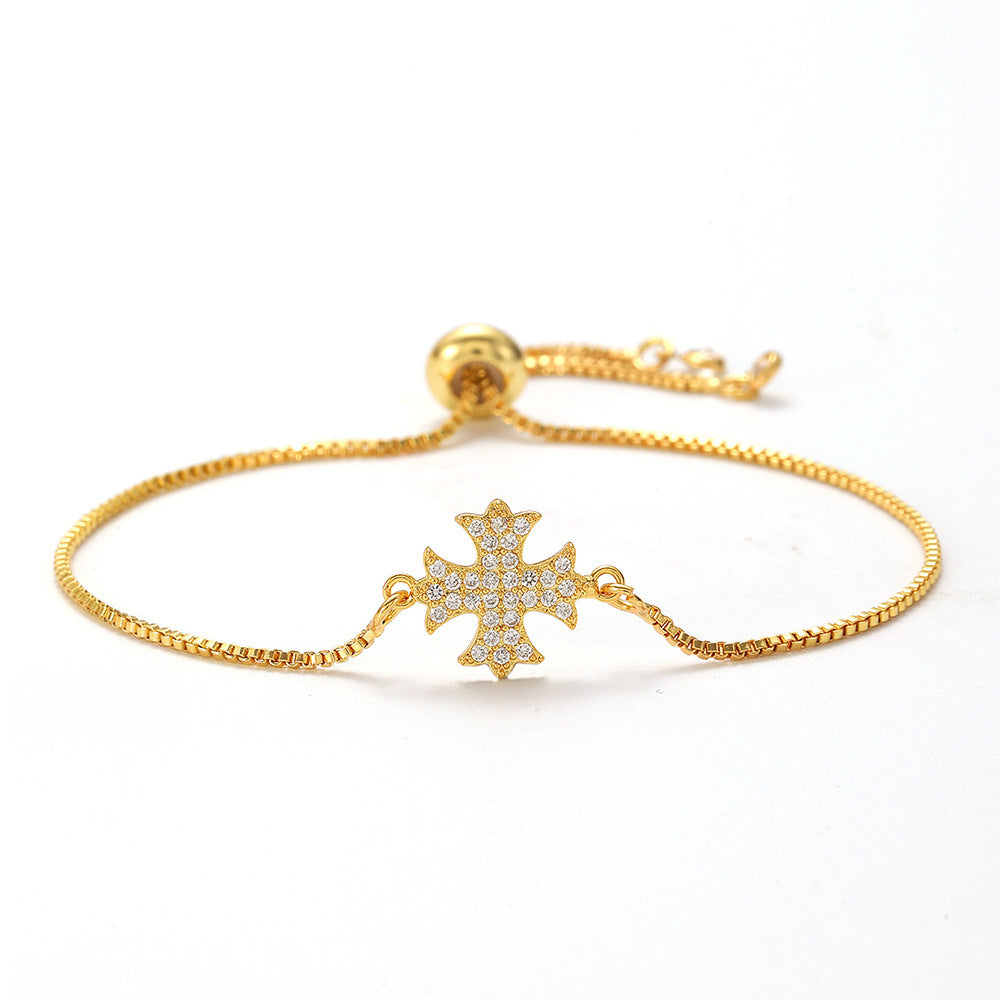 Openwork cross zircon micro-pave bracelet, waterproof and hypoallergenic jewelry for women.