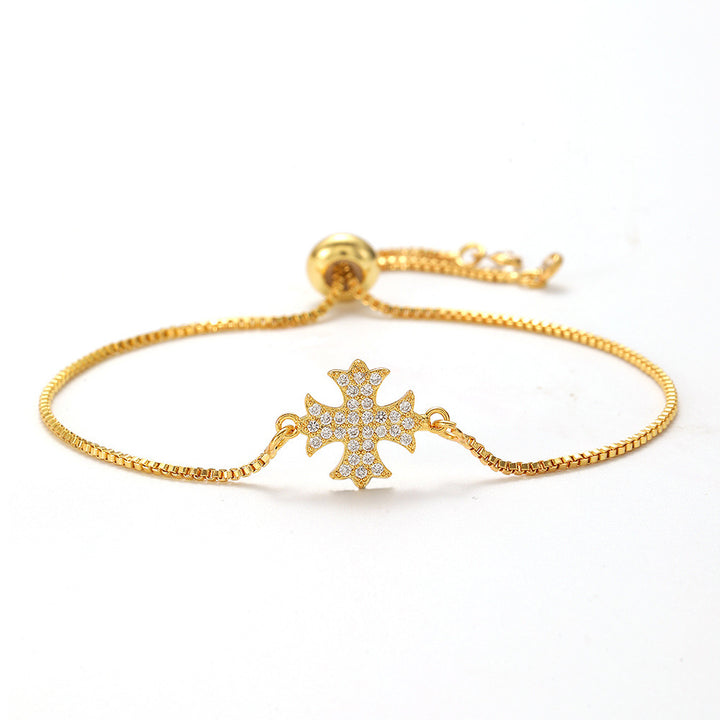 Openwork cross zircon micro-pave bracelet, waterproof and hypoallergenic jewelry for women.